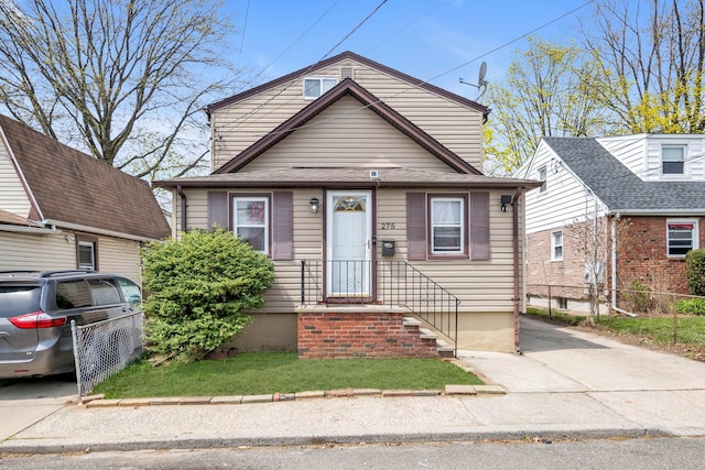 view of front of home with fence
