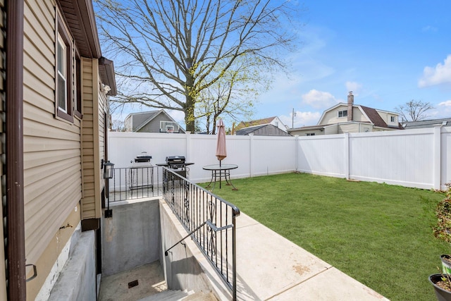 view of yard featuring a fenced backyard