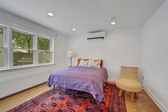 7 Senate Pl, Larchmont, NY 10538 - bedroom featuring a wall unit AC, radiator, baseboards, and recessed lighting