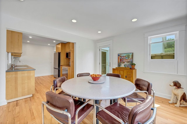 7 Senate Pl, Larchmont, NY 10538 - dining room featuring light wood-type flooring, recessed lighting, and baseboards