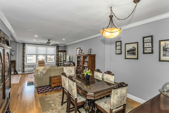 23-55 Bell Blvd Unit 6D, Bayside, NY 11360 - dining space with baseboards, recessed lighting, a ceiling fan, wood finished floors, and crown molding