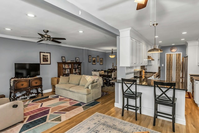 23-55 Bell Blvd Unit 6D, Bayside, NY 11360 - living area featuring recessed lighting, light wood finished floors, a ceiling fan, and crown molding