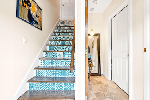 staircase with baseboards