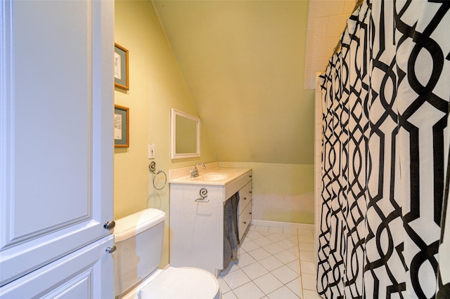 bathroom featuring toilet, lofted ceiling, tile patterned flooring, a shower with shower curtain, and vanity