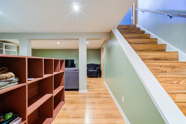 interior space featuring recessed lighting and wood finished floors