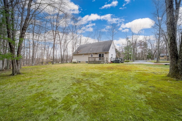 view of yard featuring a wooden deck
