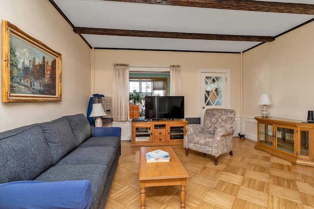 living area featuring beam ceiling