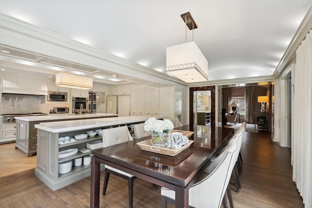99 Wheatley Rd, Old Westbury, NY 11568 - dining room with vaulted ceiling and wood finished floors