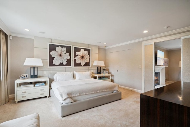99 Wheatley Rd, Old Westbury, NY 11568 - bedroom with a lit fireplace, baseboards, ornamental molding, and light colored carpet
