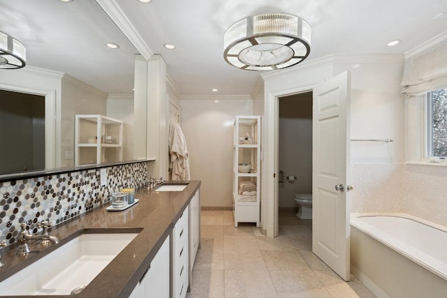 99 Wheatley Rd, Old Westbury, NY 11568 - full bathroom featuring backsplash, toilet, recessed lighting, and a sink