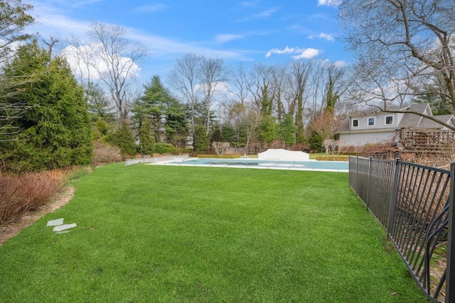 99 Wheatley Rd, Old Westbury, NY 11568 - view of yard featuring fence and a fenced in pool