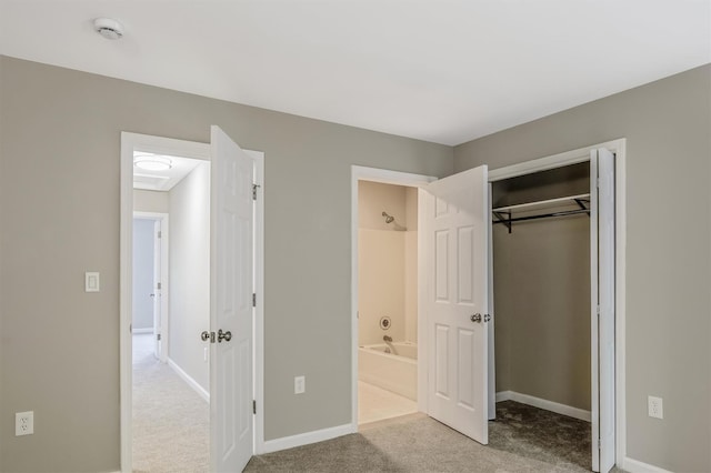 74 Foltim Way, Congers, NY 10920 - unfurnished bedroom with light colored carpet, ensuite bathroom, baseboards, and a closet