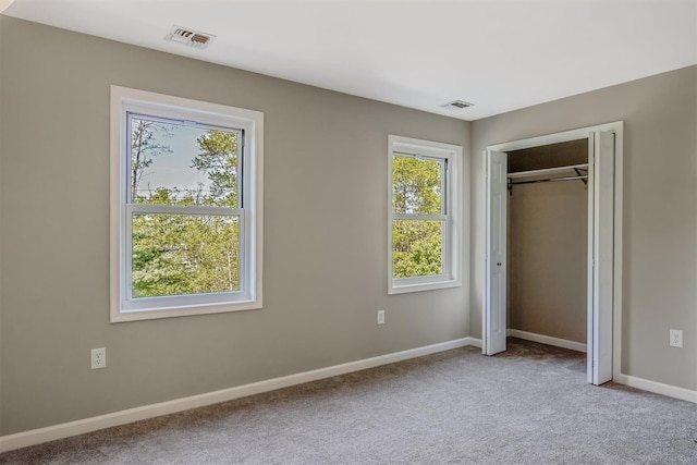 74 Foltim Way, Congers, NY 10920 - unfurnished bedroom featuring carpet, baseboards, a closet, and visible vents