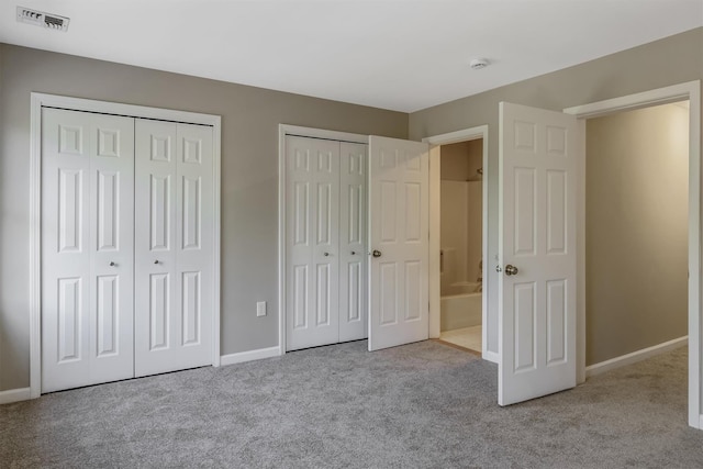 74 Foltim Way, Congers, NY 10920 - unfurnished bedroom with baseboards, multiple closets, visible vents, and carpet floors