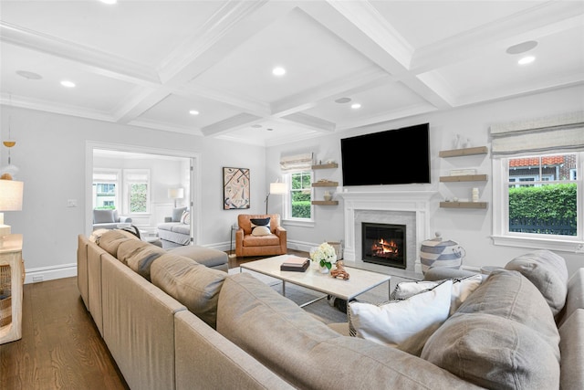 living room featuring recessed lighting, coffered ceiling, dark wood-style flooring, a glass covered fireplace, and beam ceiling