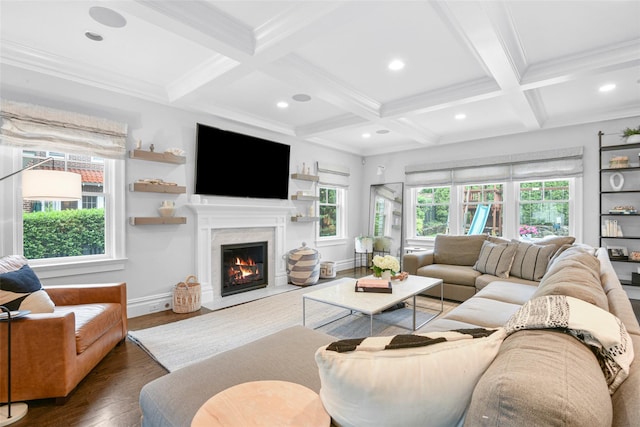 living room featuring a fireplace with flush hearth, coffered ceiling, wood finished floors, and beamed ceiling