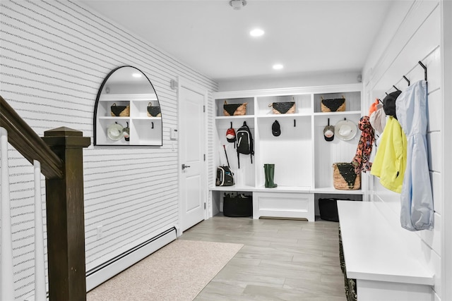 mudroom with baseboard heating and recessed lighting