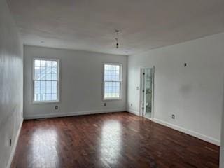 45 Manor Dr W, Poughkeepsie, NY 12603 - unfurnished room featuring plenty of natural light, wood finished floors, and baseboards