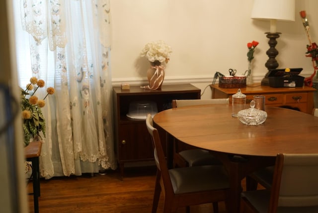 dining area featuring wood finished floors