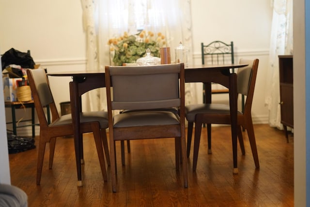 dining space featuring hardwood / wood-style flooring