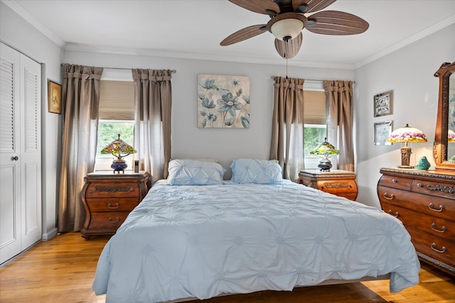 24 Akron Pl, Shoreham, NY 11786 - bedroom with crown molding, light wood finished floors, and ceiling fan