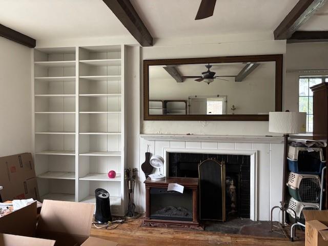 43 Garretson Rd, White Plains, NY 10604 - living area with a fireplace, wood finished floors, ceiling fan, and beamed ceiling