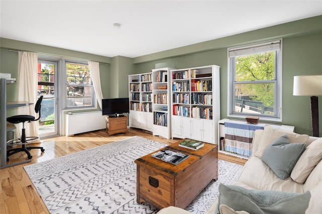 2500 Johnson Ave Unit 2Np, Bronx, NY 10463 - living room with wood finished floors, healthy amount of natural light, and an office area