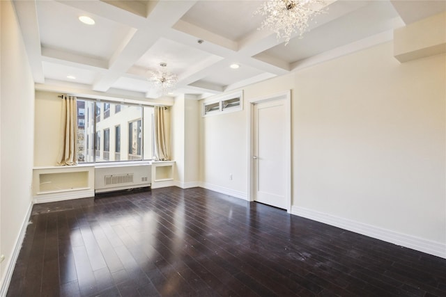 unfurnished room with baseboards, a notable chandelier, and coffered ceiling