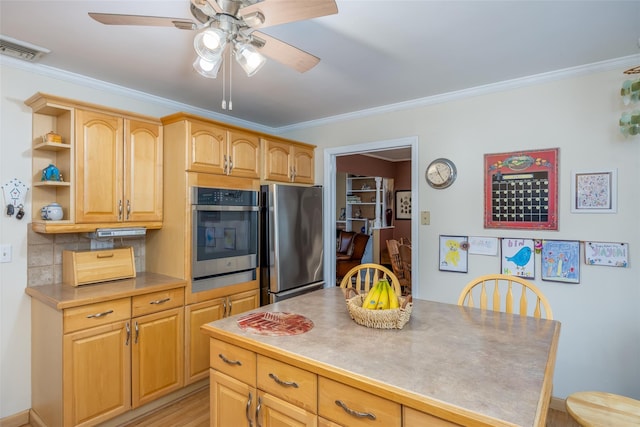 kitchen featuring visible vents, ornamental molding, open shelves, a ceiling fan, and stainless steel appliances