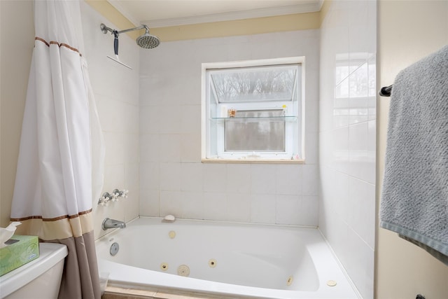 full bathroom featuring ornamental molding, a combined bath / shower with jetted tub, and toilet