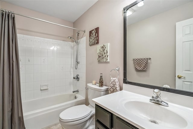 full bathroom with vanity, toilet, and shower / tub combo