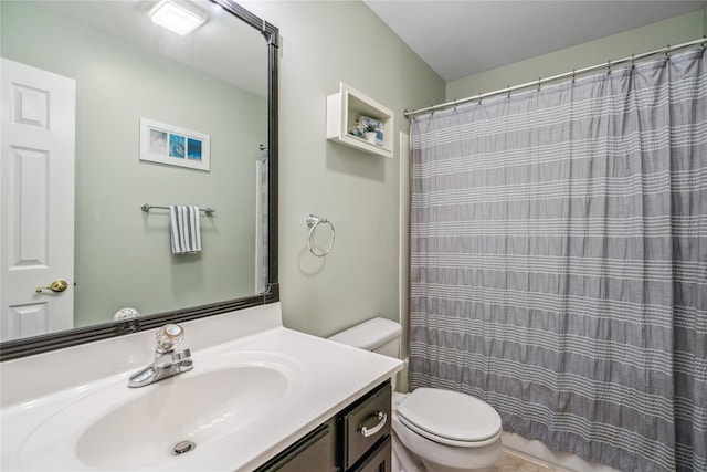 full bathroom with toilet, a shower with shower curtain, and vanity