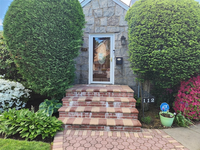 112 Rutland Rd, Hempstead, NY 11550 - doorway to property featuring stone siding