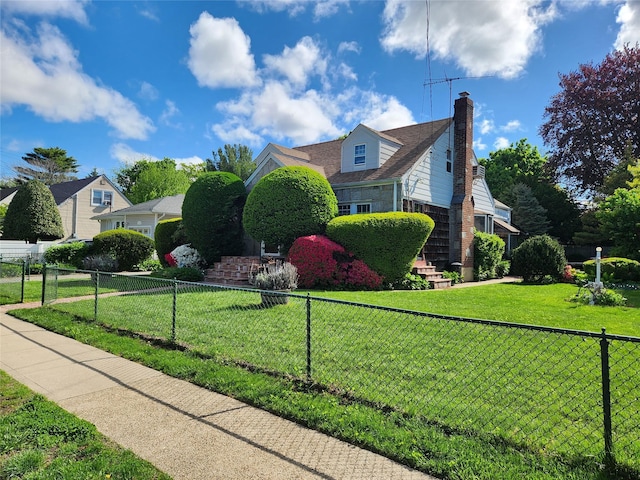 112 Rutland Rd, Hempstead, NY 11550 - view of side of home featuring a chimney