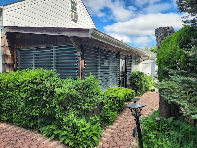 112 Rutland Rd, Hempstead, NY 11550 - view of side of home featuring a patio