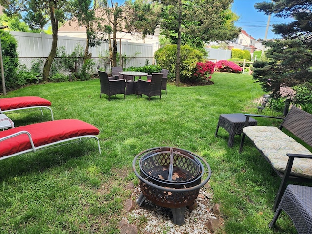 112 Rutland Rd, Hempstead, NY 11550 - view of yard with an outdoor fire pit