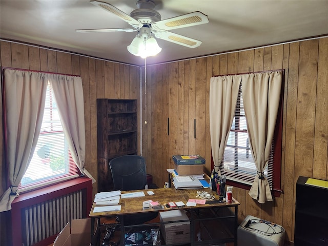 112 Rutland Rd, Hempstead, NY 11550 - home office featuring wooden walls, a ceiling fan, and plenty of natural light