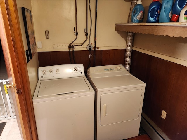 112 Rutland Rd, Hempstead, NY 11550 - laundry room with independent washer and dryer, a wainscoted wall, and wood walls