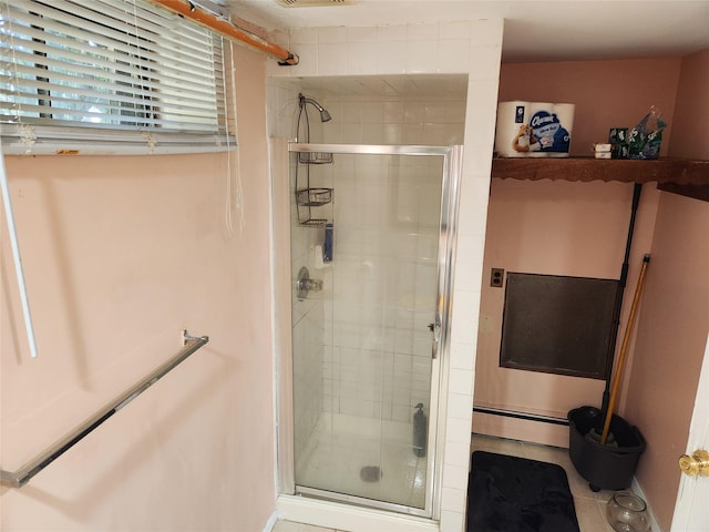 112 Rutland Rd, Hempstead, NY 11550 - full bathroom with a shower stall, baseboard heating, and tile patterned floors