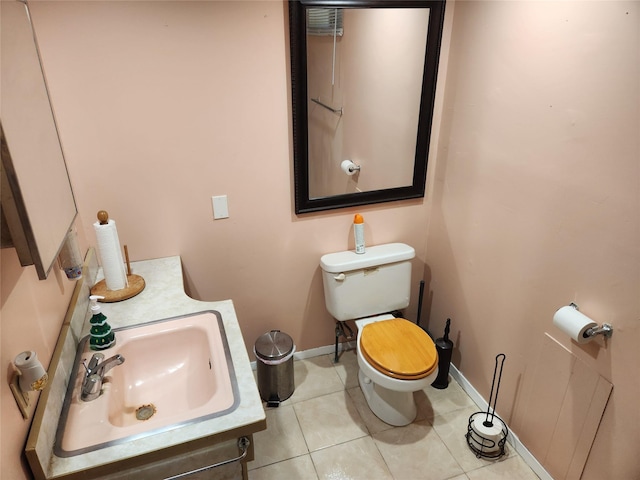 112 Rutland Rd, Hempstead, NY 11550 - bathroom with toilet and tile patterned floors