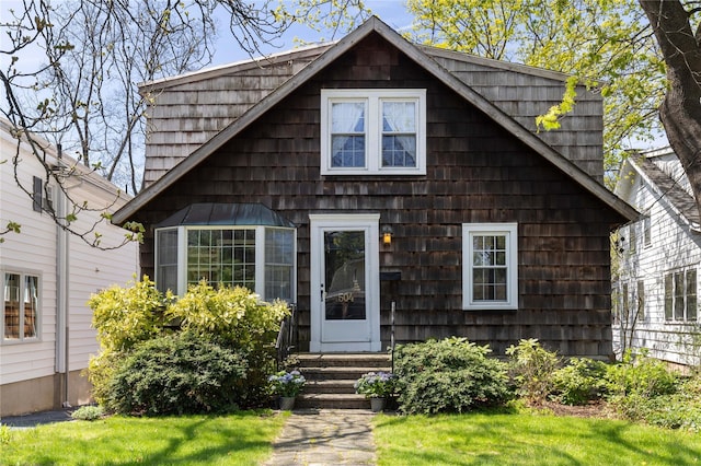 504 Milton Rd, Rye, NY 10580 - view of front of home featuring entry steps and a front lawn