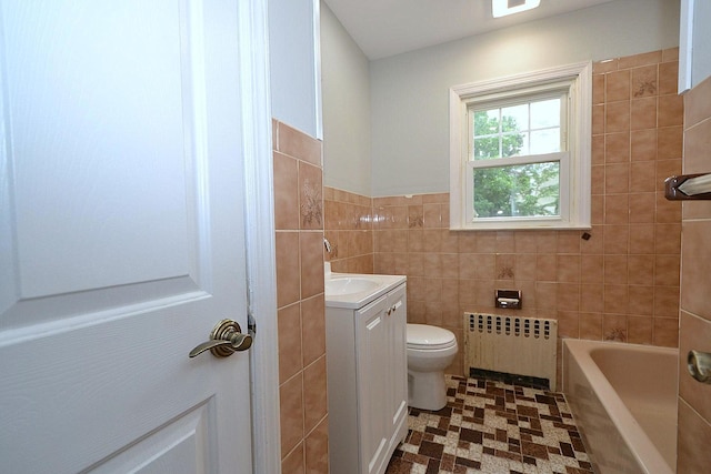 20 Richmond Blvd, Lake Grove, NY 11755 - bathroom with radiator heating unit, vanity, a bath, tile walls, and wainscoting