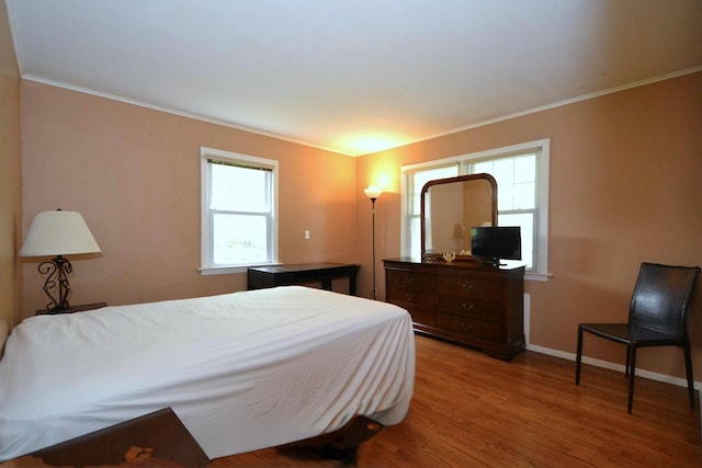 20 Richmond Blvd, Lake Grove, NY 11755 - bedroom featuring wood finished floors and crown molding