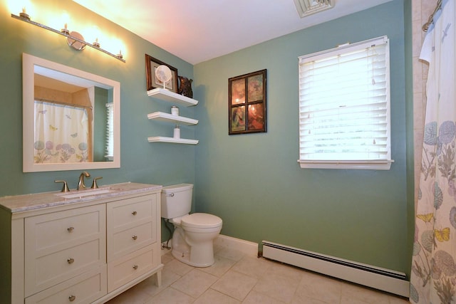 20 Richmond Blvd, Lake Grove, NY 11755 - bathroom featuring a baseboard heating unit, vanity, and tile patterned flooring