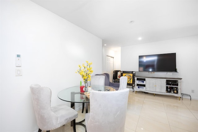 154-39 64th Ave, Flushing, NY 11367 - dining room featuring light tile patterned flooring and recessed lighting