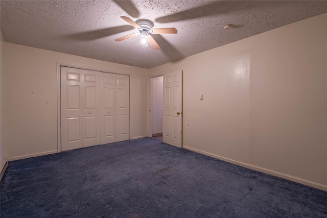 24 Timberline Trl, Pawling, NY 12564 - unfurnished bedroom featuring a textured ceiling, carpet flooring, ceiling fan, a closet, and baseboards