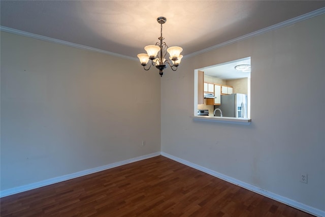 24 Timberline Trl, Pawling, NY 12564 - empty room featuring dark wood-style flooring, crown molding, a notable chandelier, and baseboards