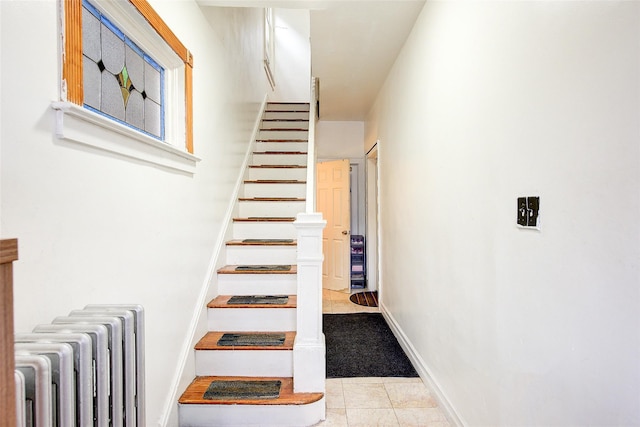 121-41 6th Ave, College Point, NY 11356 - stairs with baseboards and radiator