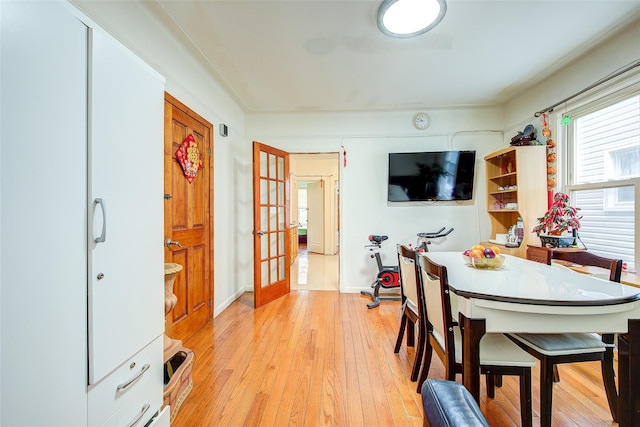 121-41 6th Ave, College Point, NY 11356 - dining room featuring light wood-style flooring and french doors