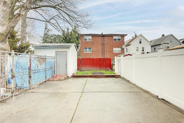 121-41 6th Ave, College Point, NY 11356 - exterior space with a storage shed, an outbuilding, and a fenced backyard